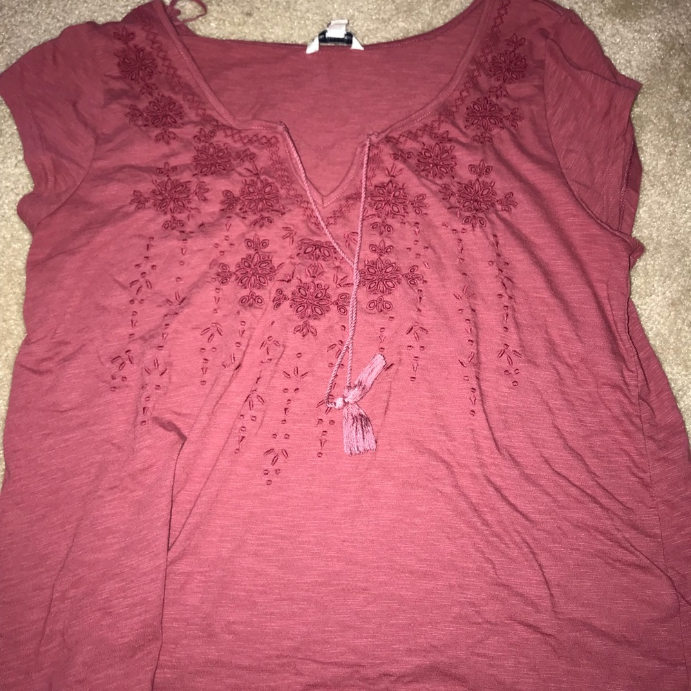 pink embroidered shirt